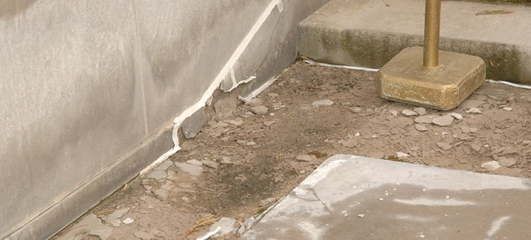 deterioration of west entrance stairway